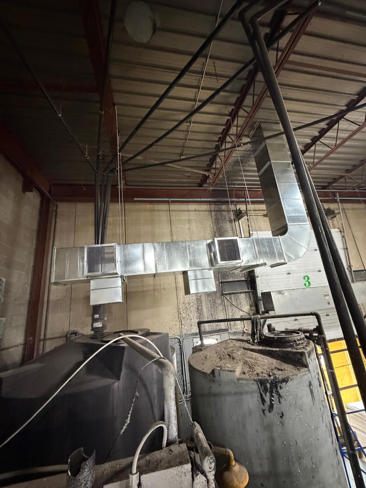 Rectangular supply duct with grilles in a plant room